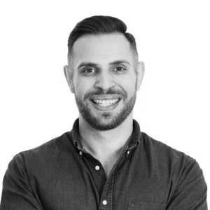 Profile head shot in black and white of Matthew Goodman